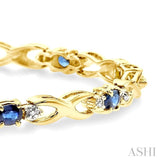 4x3 MM Oval Cut Sapphire and 1/10 Ctw Single Cut Diamond Bracelet in 10K Yellow Gold