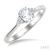 1/20 Ctw Oval Cut 6X4 MM White Topaz and Round Cut Diamond semi-precious Ring in 10K White Gold