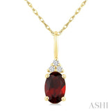 1/50 Ctw Oval Cut 6X4 MM Garnet and Round Cut Diamond Semi-Precious Pendant With Chain in 10K Yellow Gold