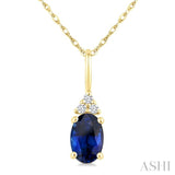 1/50 Ctw Oval Cut 6X4 MM Sapphire and Round Cut Diamond Precious Pendant With Chain in 10K Yellow Gold