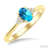 1/20 Ctw Oval Cut 6X4 MM Blue Topaz and Round Cut Diamond semi-precious Ring in 10K Yellow Gold